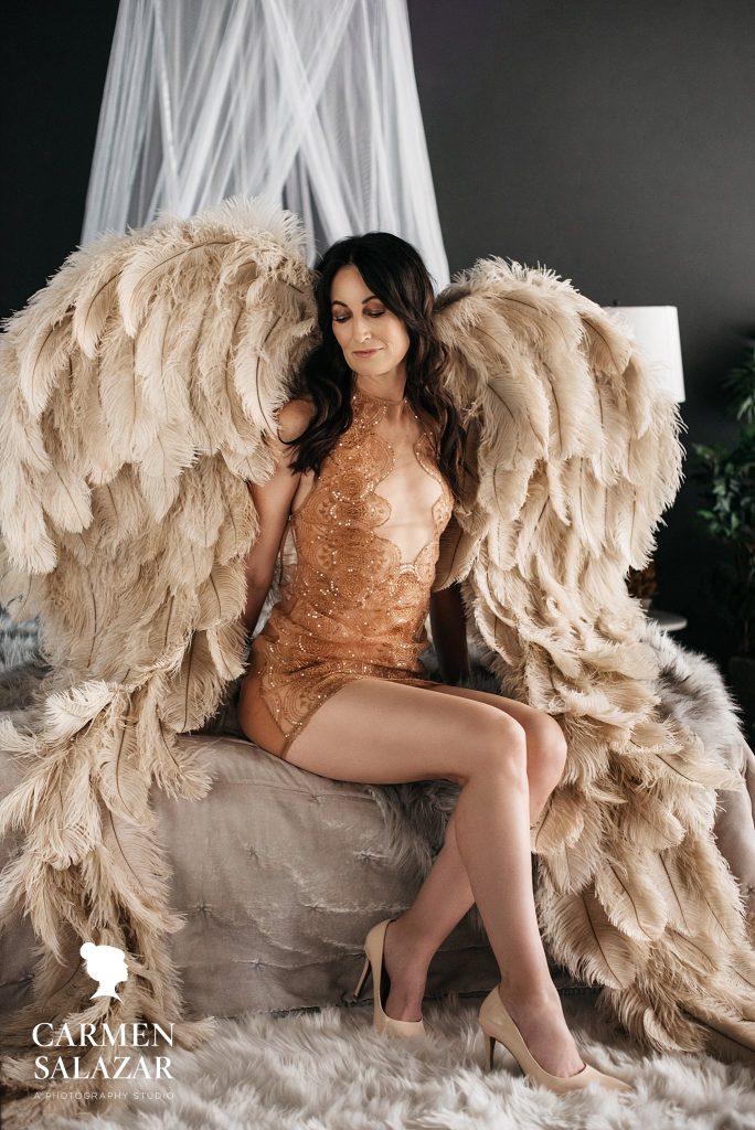 Boudoir Photography The power of a woman; Woman in sparkle shift dress with angel wings