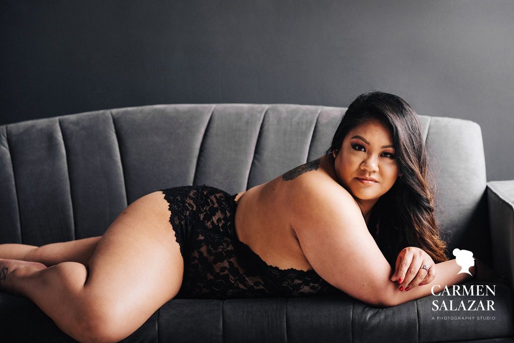 Celebrate Your Body; curvy woman in black teddy during boudoir photography session by Carmen Salazar