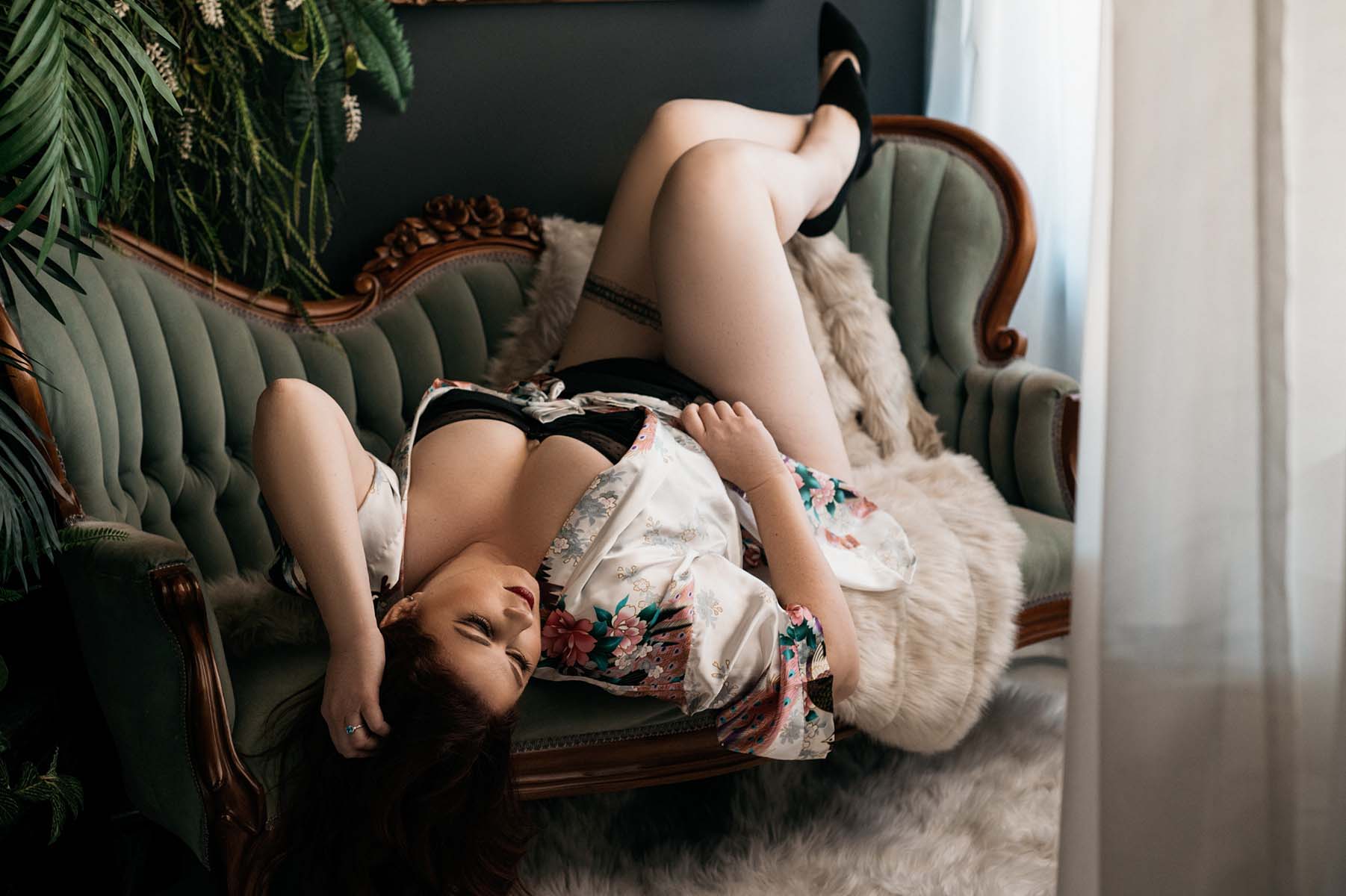 luxury-boudoir-portraits-for-healthcare-workers-sacramento Brightly lit boudoir portrait of woman posing